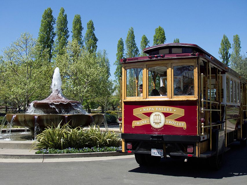 Napa Valley: Wine Tasting Tour by Open Air Trolley & Lunch - What the open-air trolley adds to the day