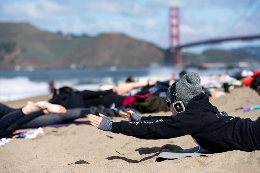 San Francisco: Silent Disco Yoga at Baker Beach - Sunday morning soulful flow