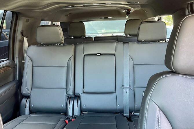 Winery and Vineyard Transportation in Luxury Full Size Black SUV - A private SUV changes the shape of a wine day